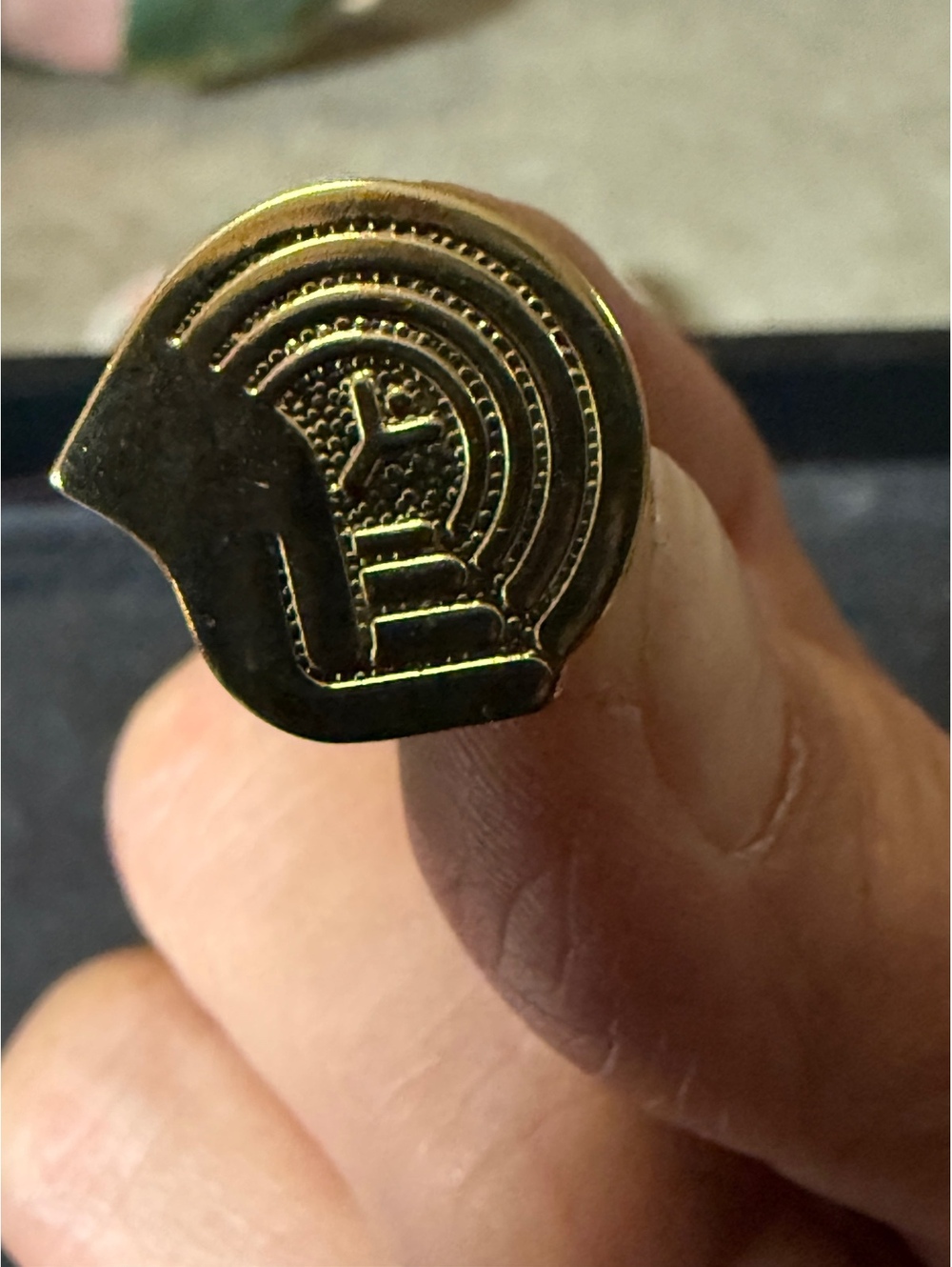 Vintage Brass Lapel Pin with Unique Circular Design